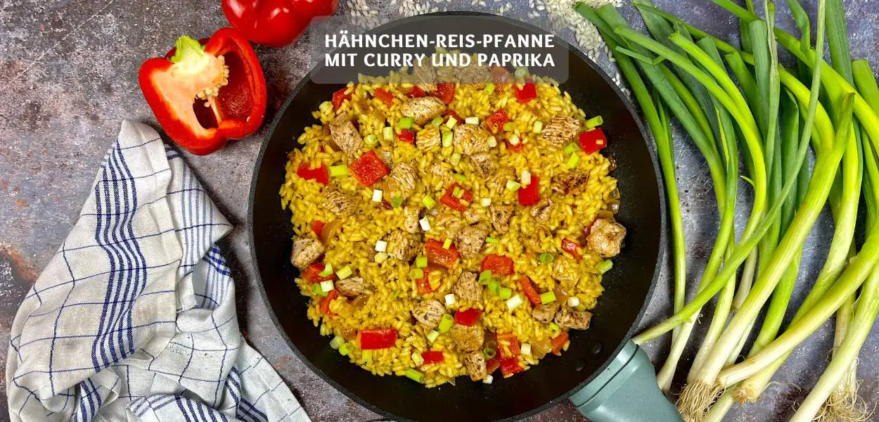 Hähnchen-Reis-Pfanne mit Curry und Paprika